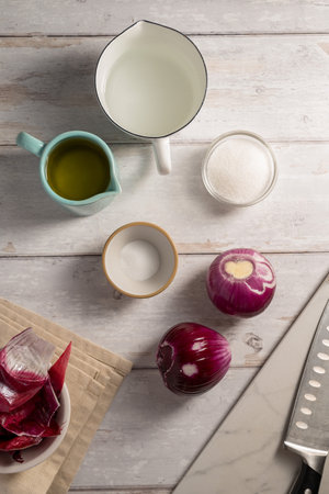 Cooking homemade pickled red onions ingredients, bright backgroundの写真素材