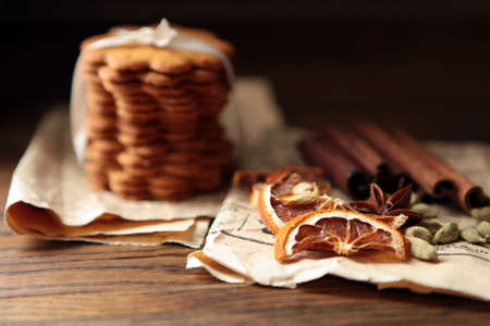 Homemade cookies on dark rustic wooden table, copy space. Healthy vegan wholegrain cookies.