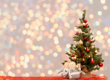 Christmas greeting card vintage. New Year ,Christmas Mock up. Close-up Decorated Christmas tree...