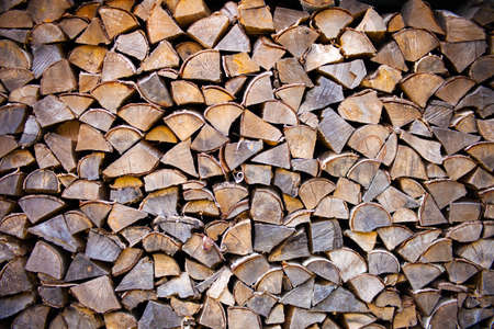 Pile of wood logs ready for winter - landscape exteriorの写真素材