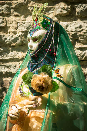 woman in green carnival venetian costume-Traditionally dressedの写真素材