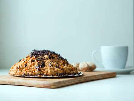anthill cake with chocolate, cookies, walnuts, condensed milk. Homemade traditional Soviet dessertの写真素材