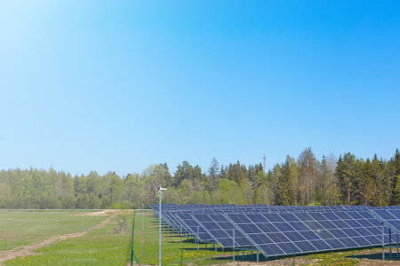 Solar panels on sky background. power plant. Blue panels farm. Alternative source of electricity.