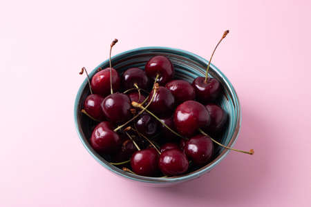 dark cherry in the bowlの写真素材