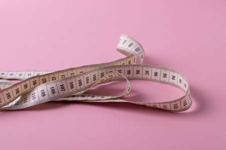 diet concept or lifestyle concept on pink backgroundの写真素材