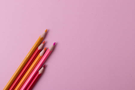 different stationary items and notebooks on mono color background. minimalism. flat lay