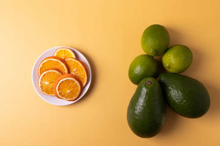 citruses on the yellow. top view