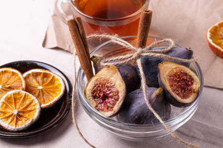 fresh ripe sweet figs on rustic background