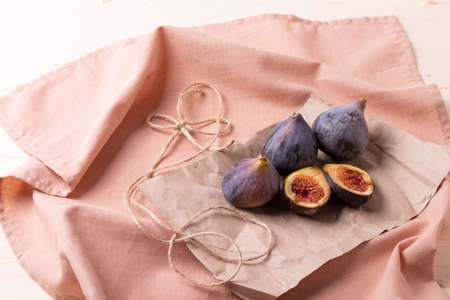 fresh ripe sweet figs on rustic background