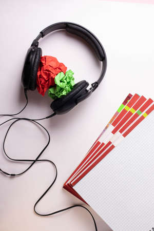 different stationary supplies items on white office or studying deskの写真素材