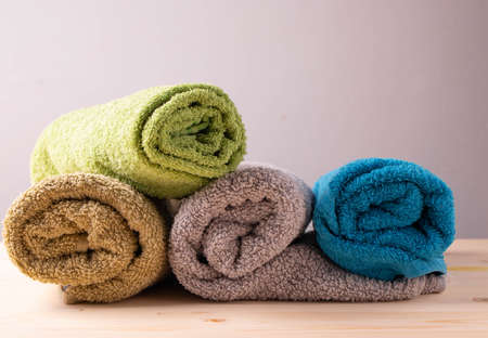 a group of bath towels in rollsの写真素材