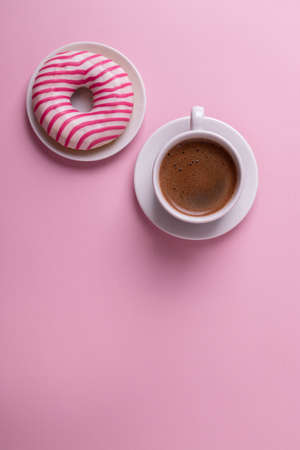 sweet yummy doughnuts and coffee in a ceramic cupの写真素材