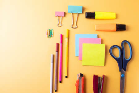 a group of different colorful stationary itemsの写真素材