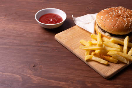 burger on rustic wooden surfaceの写真素材