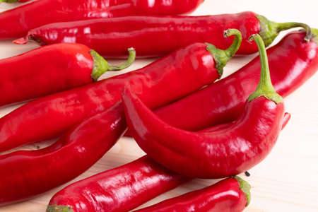 a group of red chilli peppersの写真素材