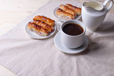 sweet tasty honey pastry treats and espresso as coffee break conceptの写真素材