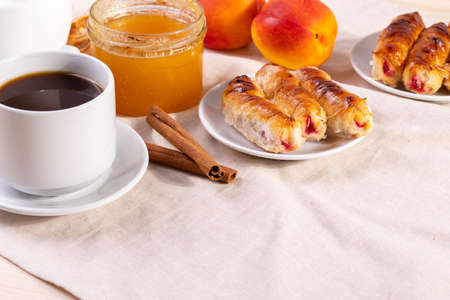 sweet tasty honey pastry treats and espresso as coffee break conceptの写真素材