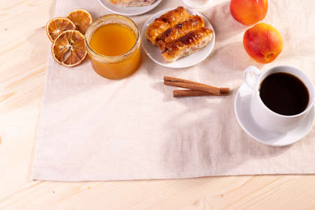 sweet tasty honey pastry treats and espresso as coffee break conceptの写真素材