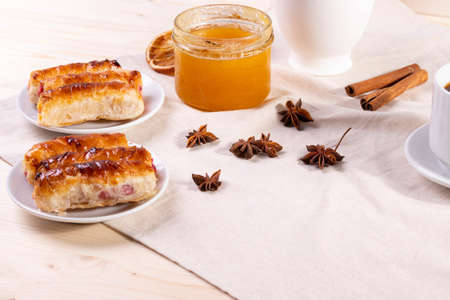 sweet tasty honey pastry treats and espresso as coffee break concept