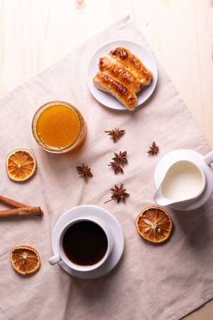 sweet tasty honey pastry treats and espresso as coffee break conceptの写真素材