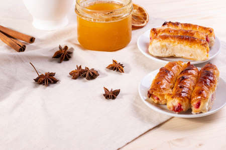 sweet tasty honey pastry treats and espresso as coffee break conceptの写真素材