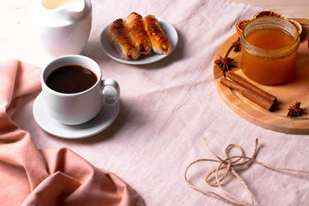 sweet tasty honey pastry treats and espresso as coffee break conceptの写真素材