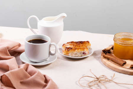 sweet tasty honey pastry treats and espresso as coffee break conceptの写真素材