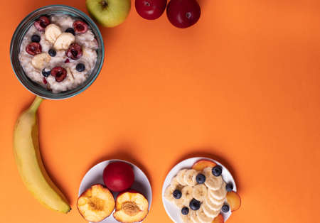 fruit and oat meal porridge for breakfastの写真素材