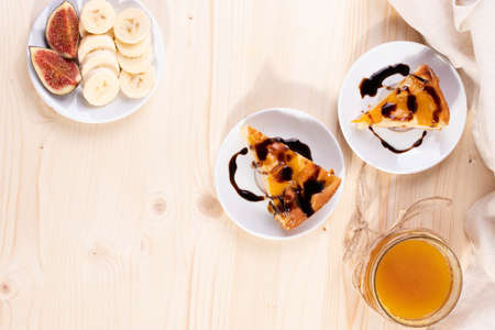 delicious banana and honey, apricot pie. selective focus. close up shot. wooden surface
