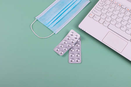 pills and a face mask