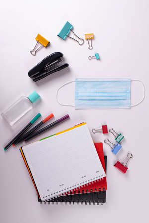 stationary and a face mask