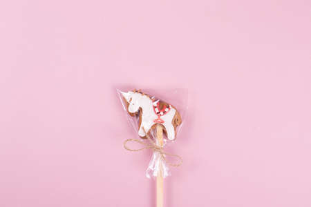 sweet yummy festive colorful lollipops on light blue background. copy space for text. minimalism styleの写真素材