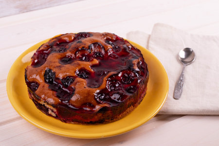 delicious freshly baked berry pie on a rustic backgroundの写真素材
