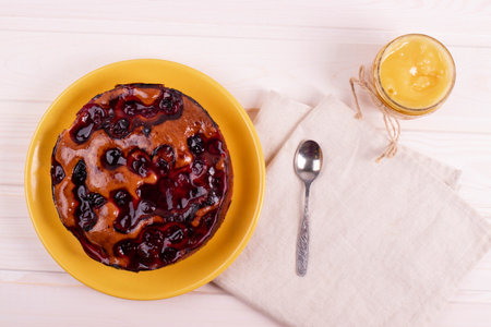delicious freshly baked berry pie on a rustic backgroundの写真素材