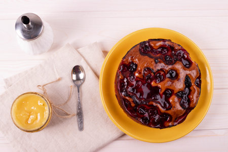 delicious freshly baked berry pie on a rustic backgroundの写真素材