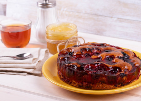 delicious freshly baked berry pie on a rustic backgroundの写真素材