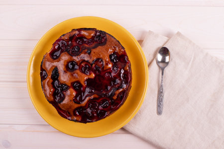 delicious freshly baked berry pie on a rustic backgroundの写真素材