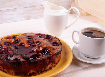 delicious freshly baked berry pie on a rustic backgroundの写真素材