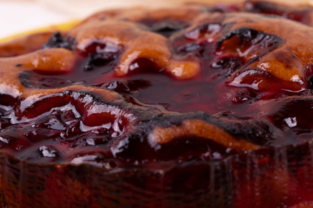 delicious freshly baked berry pie on a rustic backgroundの写真素材