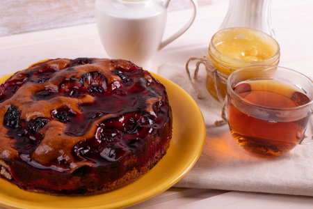 delicious freshly baked berry pie on a rustic backgroundの写真素材