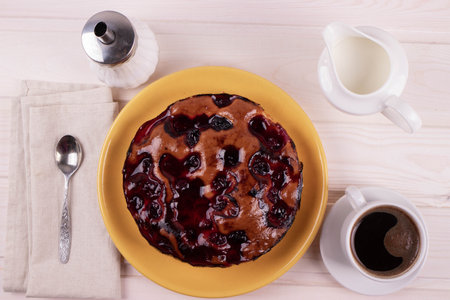 delicious freshly baked berry pie on a rustic backgroundの写真素材