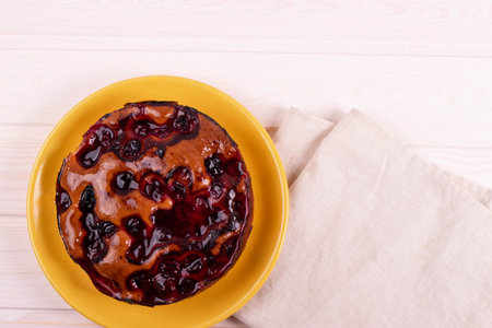 delicious freshly baked berry pie on a rustic backgroundの写真素材