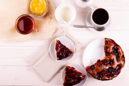 delicious baked jam biscuit pie on the light wooden surfaceの写真素材