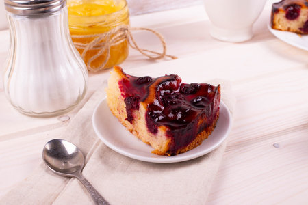 delicious baked jam biscuit pie on the light wooden surfaceの写真素材