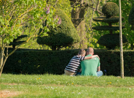 A father and son having a quiet moment togetherの写真素材