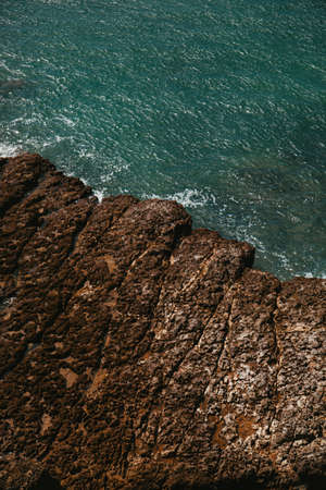 Stone ledge in the Atlantic Ocean, Cascais, Portugalの写真素材