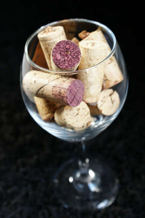 Corks in a standing Wine glassの写真素材