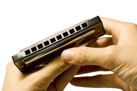 holding harmonicaの写真素材