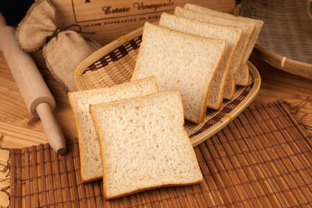 Bamboo curtains, clubs, and burlap bags present delicious toast in bamboo baskets
