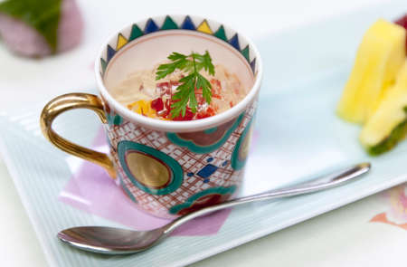 A close-up of delicious, delicious and refreshing desserts with brightly colored flower tea cups